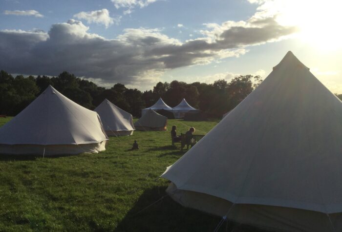 Sunset over the bell tents at GreenAcre Events, Devon